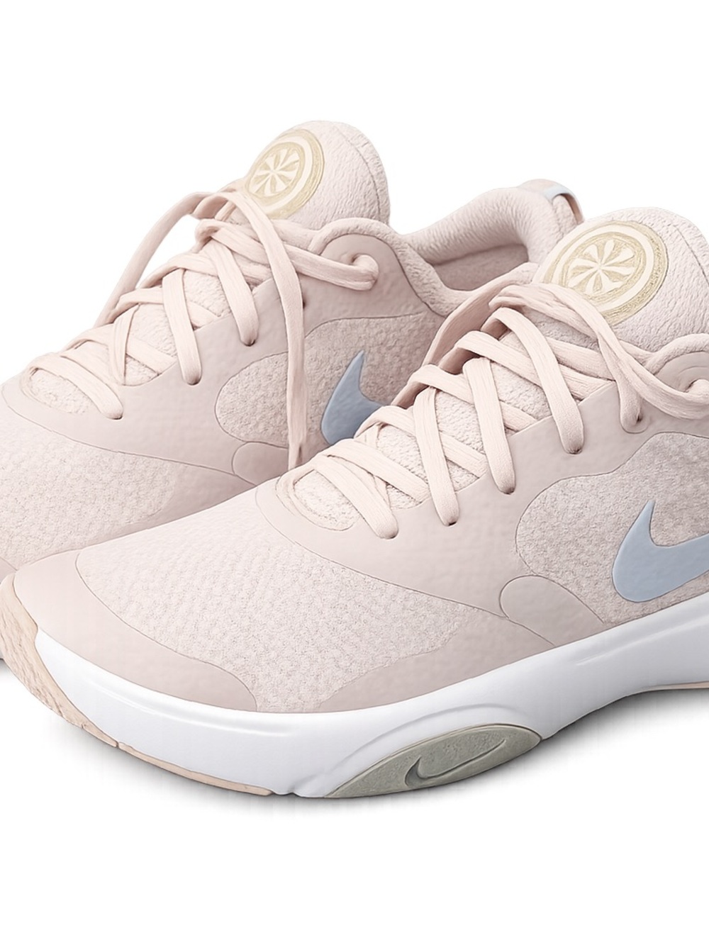 Nike Women's Pale Pink Low-Profile Running Sneakers with Light Blue Swoosh